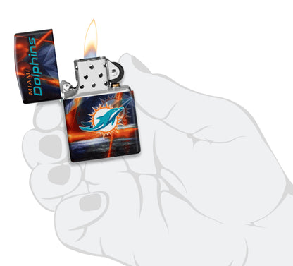 Zippo NFL Miami Dolphins 540 Matte Windproof Lighter lit in hand.