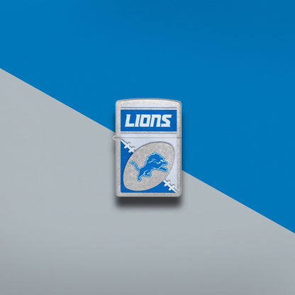 Lifestyle image of Zippo NFL Detroit Lions Street Chrome Windproof Lighter set on a blue and light gray background.