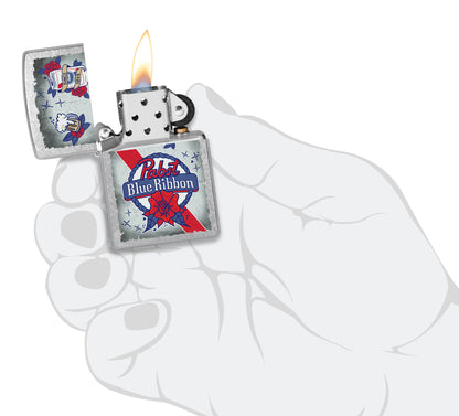 Pabst Blue Ribbon® Artwork Design Street Chrome Windproof Lighter lit in hand.

