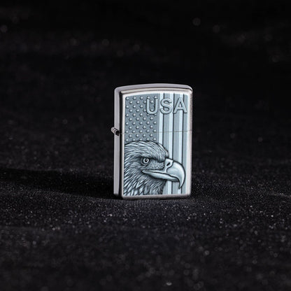 Lifestyle image of Zippo USA Pride Design Satin Chrome Windproof Lighter standing showing the front of the lighter with a black shimmer fabric background. 