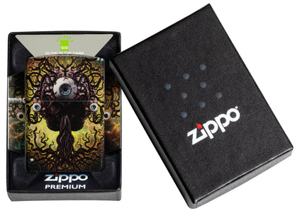 Zippo Evil Eye Design 540 Glow in the Dark Windproof Lighter in its packaging.