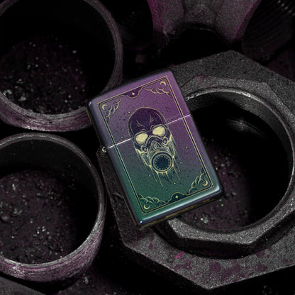 Lifestyle image of Zippo Gas Mask Design Iridescent Windproof Lighter lying flat on a few metal couplings, showing the front of the lighter. 

