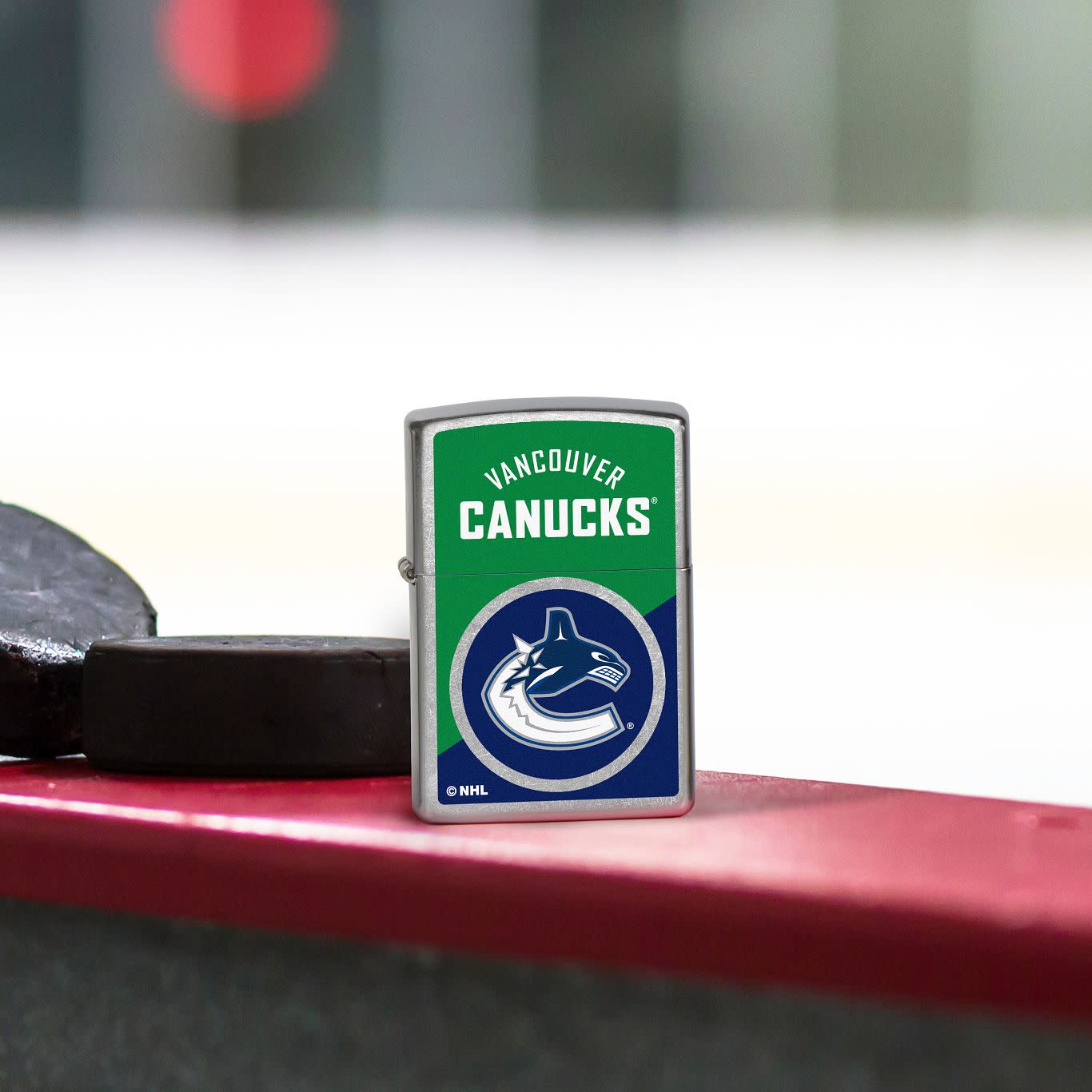 Front view of Zippo NHL® Vancouver Canucks® 2024 Street Chrome™ Windproof Lighter.