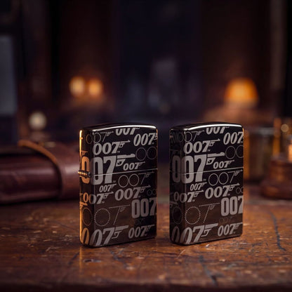 Lifestyle image of two Zippo James Bond 007™ Logo Design High Polish Black Windproof Lighters both standing on a bar. One showing the front and hinge side of the lighter while the other lighter is showing the back and non-hinge side of the lighter with an out of focus bar scene as the background. 

