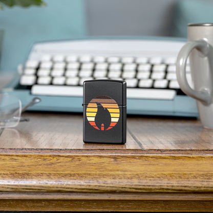 Lifestyle image of Zippo Colorblock Zippo Design Black Matte Windproof Lighter standing on a desk in front of a typewriter.