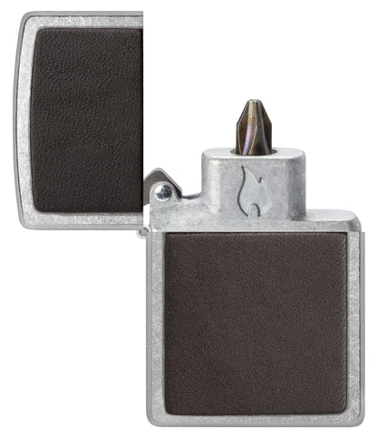 Brown Leather Emblem Design Windproof Lighter with its lid open and showing the Bit Safe Screwdriver USA. 