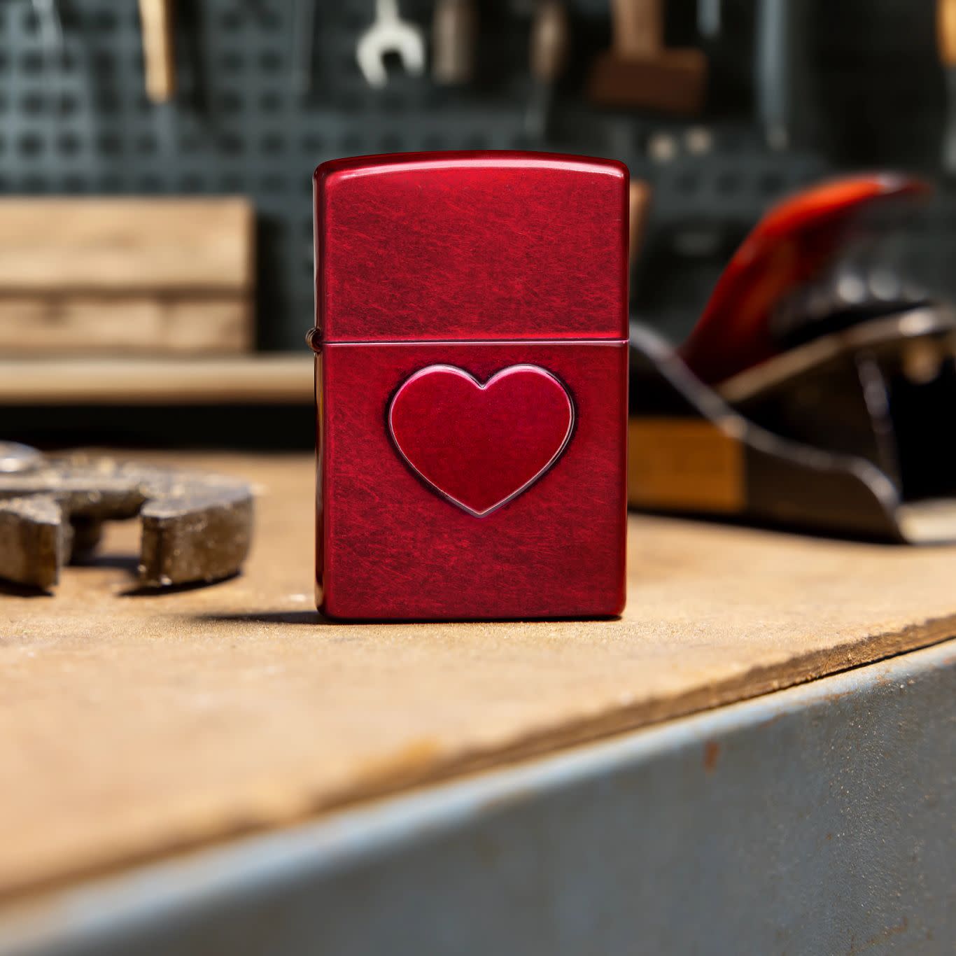 Lifestyle image of Zippo Stamped Heart Design Candy Apple Windproof Lighter