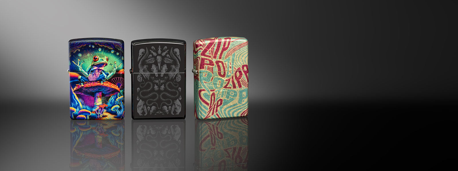 Three colorful lighters on a reflective surface with a dark background