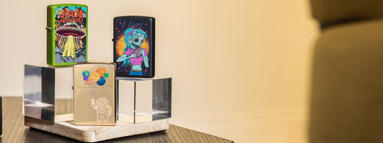 Collection of colorful lighters on a stand with a neutral background