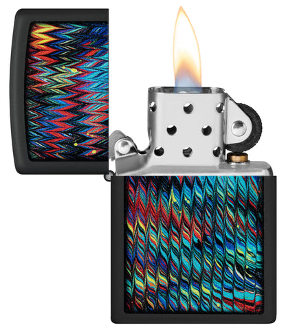 Zippo Paint Pour Design Black Matte Windproof Lighter with its lid open and lit.