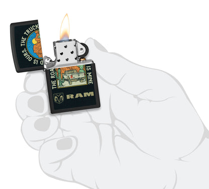 Zippo Ram The Truck is Mine Design Black Matte Windproof Lighter lit in hand.