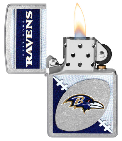 Zippo NFL Baltimore Ravens Street Chrome Windproof Lighter with its lid open and lit.