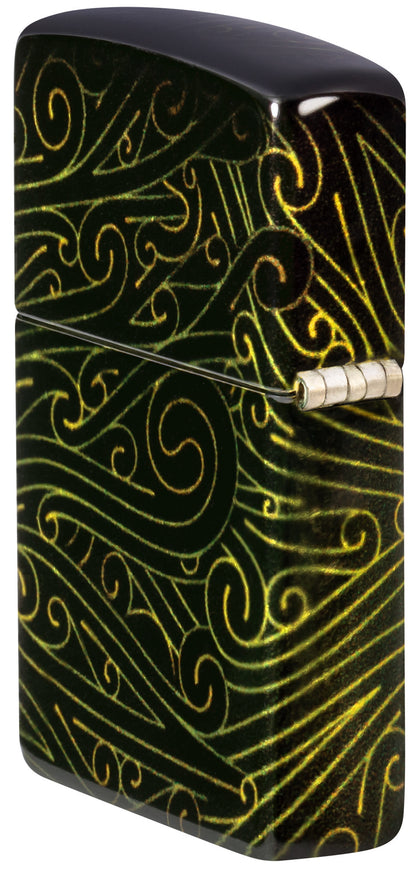 Angled shot of Zippo Cannabis Maze Design 540 Tumbled Brass Windproof Lighter showing the back and hinge side of the lighter.