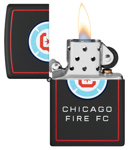 Zippo Chicago Fire FC Windproof Lighter with its lid open and lit.