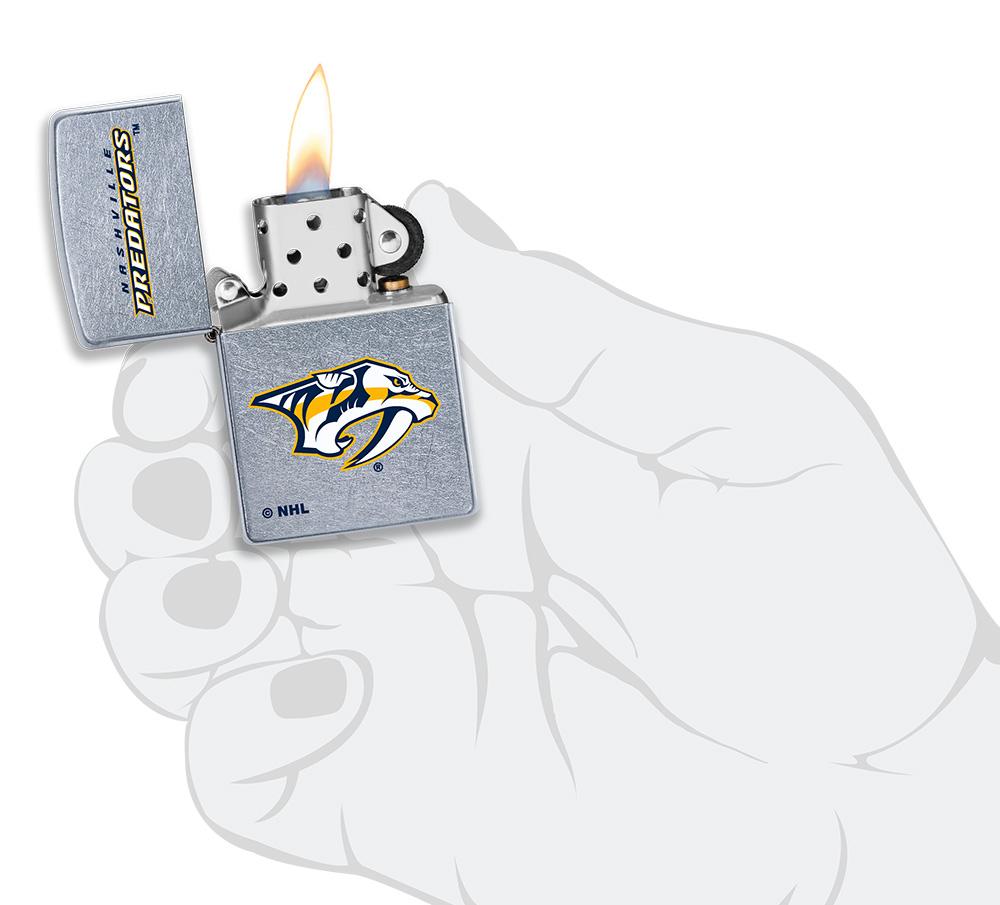 ©NHL Nashville Predators Street Chrome™ Windproof Lighter lit in hand