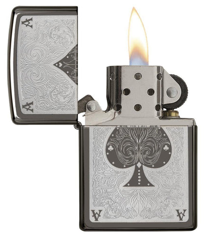 Ace Filigree Engraved Windproof Lighter with its lid open and lit.