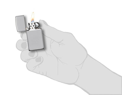 Zippo Slim® Armor High Polish Chrome Lighter lit in hand.