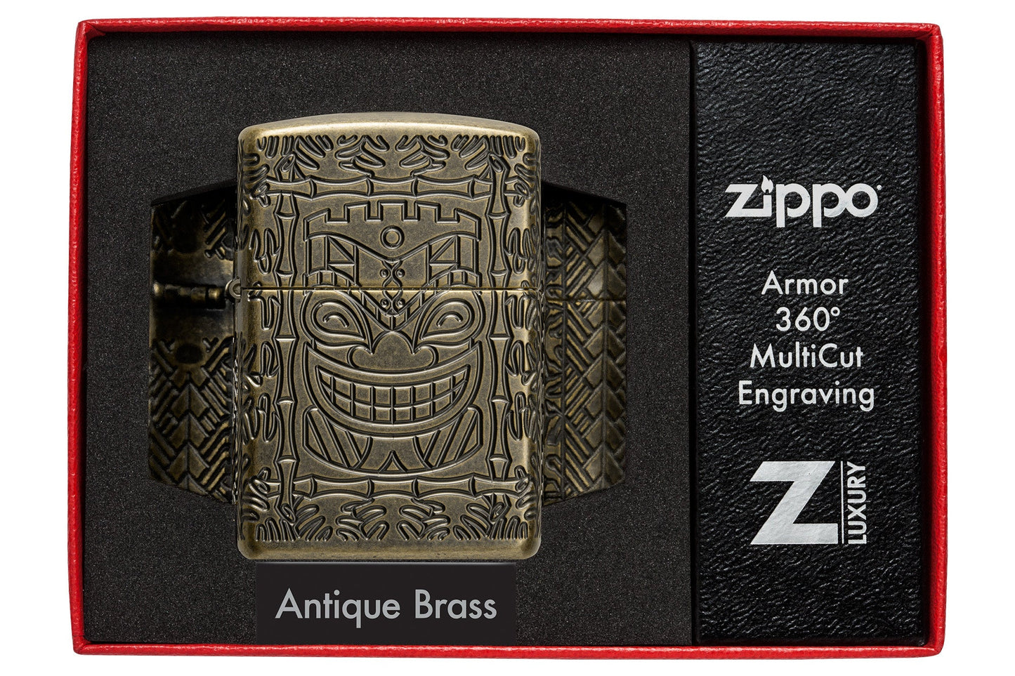 Tiki Design Armor® Antique Brass Windproof Lighter in it's packaging.