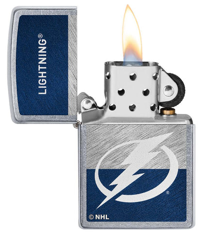 NHL® Tampa Bay Lightning Street Chrome™ Windproof Lighter with its lid open and lit