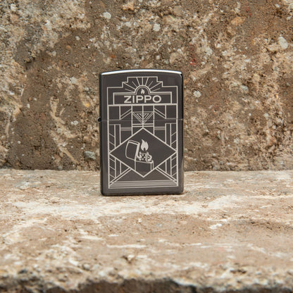 Lifestyle image of Zippo Art Deco Design Black Ice® Windproof Lighter standing on a counter top.