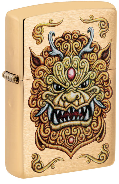 Front shot of Zippo Foo Dog Design Brushed Brass Windproof Lighter standing at a 3/4 angle.