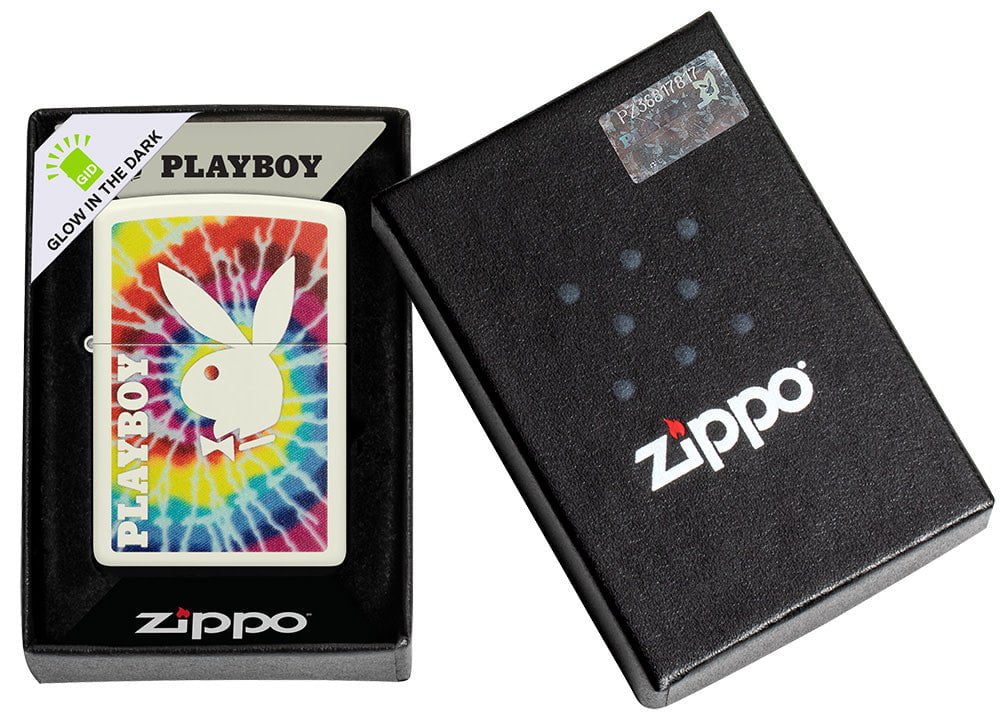 Playboy Tie-Dye Glow In the Dark Windproof Lighter with the lid open and lit.