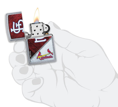 MLB® St. Louis Cardinals™ Street Chrome™ Windproof Lighter lit in hand.