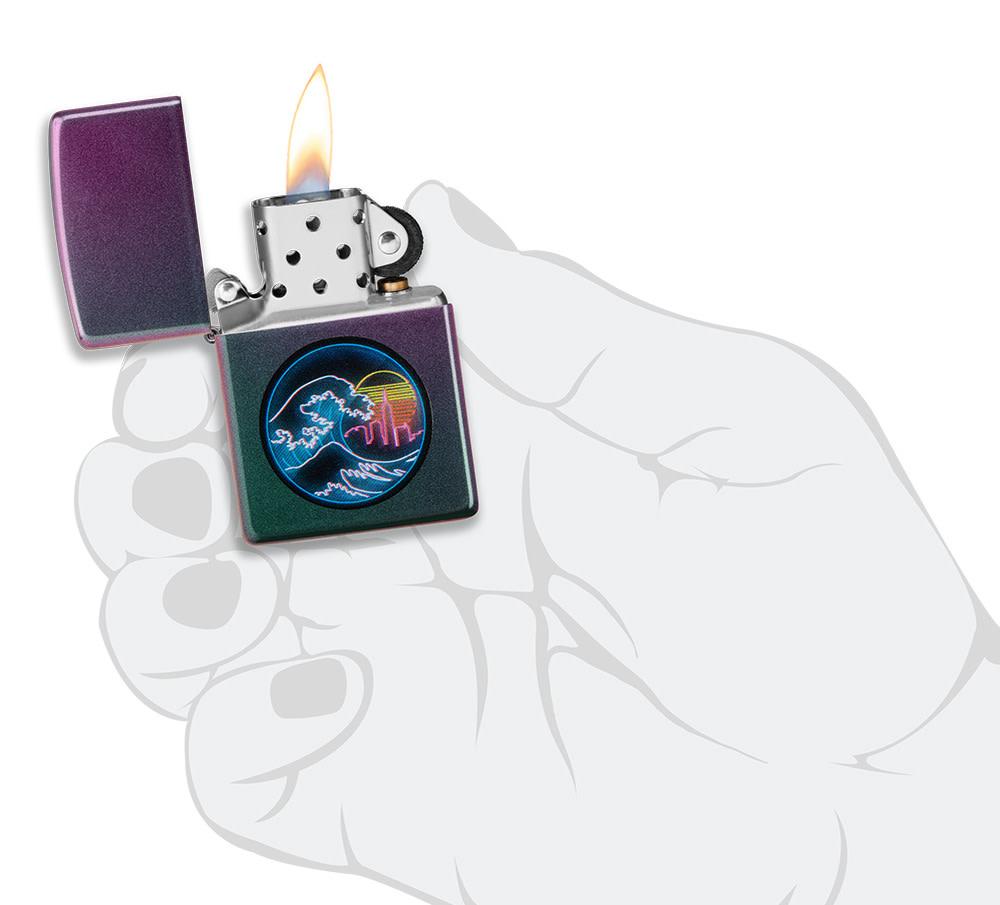 Great Vaporwave Iridescent Windproof Lighter lit in hand