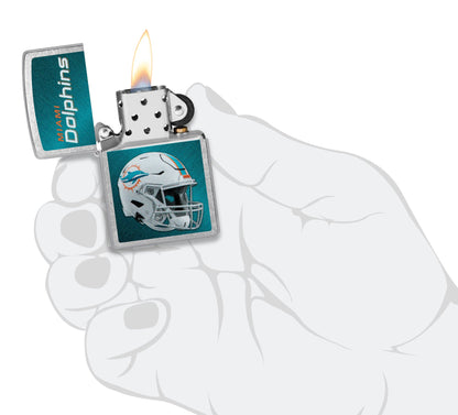 NFL Miami Dolphins Helmet Street Chrome Windproof Lighter lit in hand.